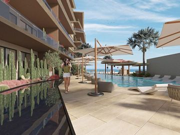 Condominio con vista al mar, techos altos, club de playa, concierge, carril de n