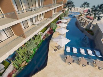 Condominio con vista al mar, techos altos, club de playa, concierge, carril de n