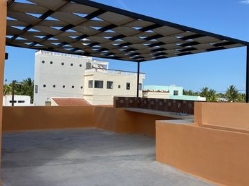 Lofts en venta en Chelem, con piscina y rooftop, entrega inmediata.