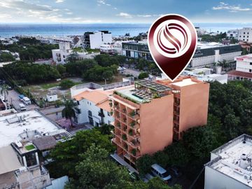 Condominio con alberca infinity, jacuzzi, area de hamacas, gimnasio, co-working,