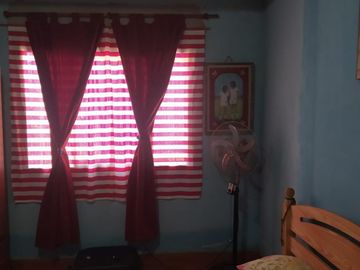 Vendo terreno 10 x 20m. Con vivienda en Merlo