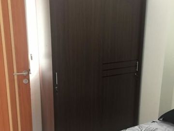 Apt. Puncak Dharmahusada 2BR Hadap Selatan, Full Furnish