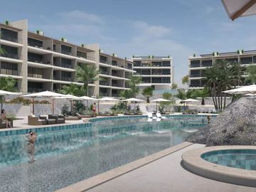 Condominio con alberca infinity vista al mar, spa, pet park, area de juegos para