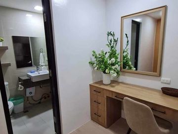 furnished 2-bedroom condo unit with 1-car park, for sale in Mactan Newtown