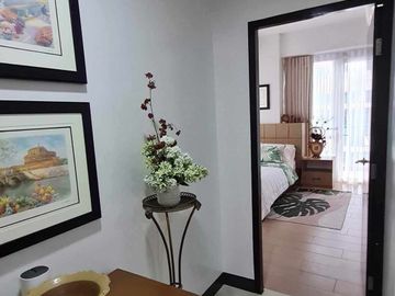 furnished 2-bedroom condo unit with 1-car park, for sale in Mactan Newtown