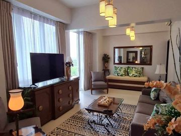 furnished 2-bedroom condo unit with 1-car park, for sale in Mactan Newtown