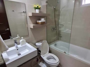 furnished 2-bedroom condo unit with 1-car park, for sale in Mactan Newtown