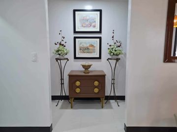 furnished 2-bedroom condo unit with 1-car park, for sale in Mactan Newtown
