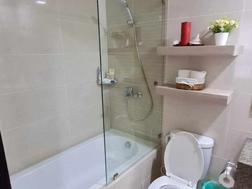 furnished 2-bedroom condo unit with 1-car park, for sale in Mactan Newtown