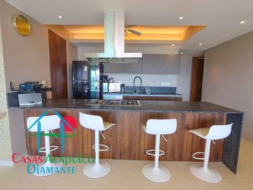 Depa de playa en renta mensual y vacacional. Terraza con vista a los jardines y albercas