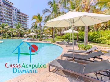 Depa de playa en renta mensual y vacacional. Terraza con vista a los jardines y albercas