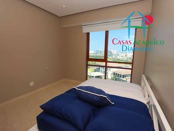 Depa de playa en renta mensual y vacacional. Terraza con vista a los jardines y albercas
