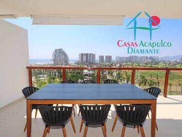 Depa de playa en renta mensual y vacacional. Terraza con vista a los jardines y albercas
