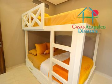 Depa de playa en renta mensual y vacacional. Terraza con vista a los jardines y albercas