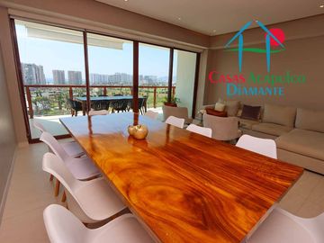 Depa de playa en renta mensual y vacacional. Terraza con vista a los jardines y albercas