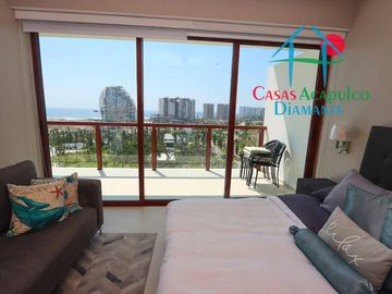 Depa de playa en renta mensual y vacacional. Terraza con vista a los jardines y albercas