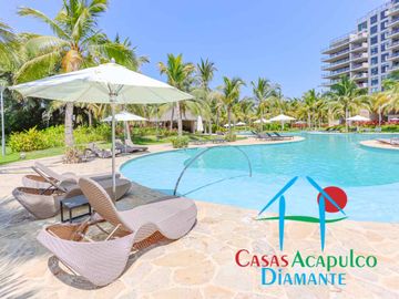 Depa de playa en renta mensual y vacacional. Terraza con vista a los jardines y albercas
