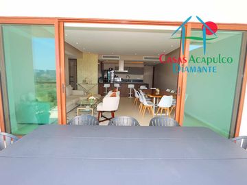 Depa de playa en renta mensual y vacacional. Terraza con vista a los jardines y albercas