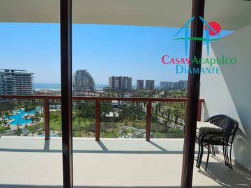 Depa de playa en renta mensual y vacacional. Terraza con vista a los jardines y albercas