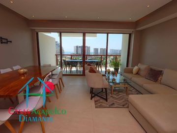 Depa de playa en renta mensual y vacacional. Terraza con vista a los jardines y albercas
