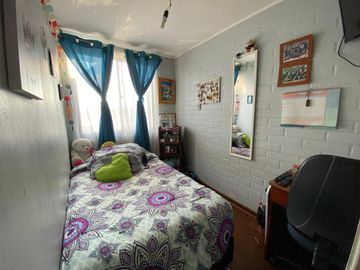 Casa Ampliada en Villa Pehuén, Maipú.