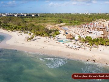 Condo con 2 terrazas, cuarto de servicio, alacena oculta, vista al campo de golf, en venta, Corasol Playa del Carmen.