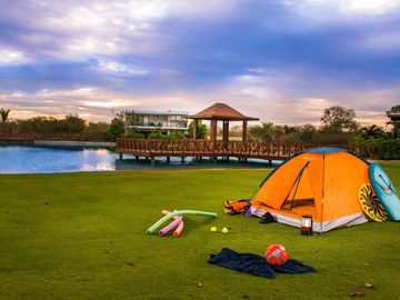 Departamento en venta con vista al campo de golf y lago, en Yucatan Country Club, venta Mérida.