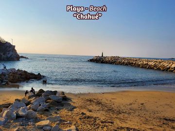 Residencia con alberca, jardín, 6 recamaras, en venta Sector O Huatulco.