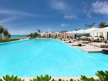 DEPARTAMENTO EN VENTA FRENTE AL MAR EN PUERTO CANCÚN, QUINTANA ROO, EXCLUSIVIDAD, LUJO Y PLUSVALÍA