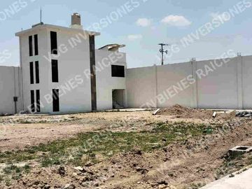 TERRENO 32,500 mts cuadrados, BARDEADO 100% IDEAL ARA BODEGAS, USO INDUSTRIAL Y COMERCIAL