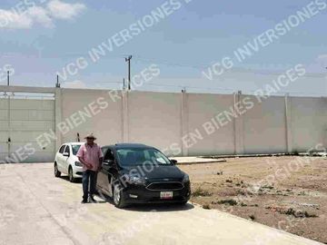 TERRENO 32,500 mts cuadrados, BARDEADO 100% IDEAL ARA BODEGAS, USO INDUSTRIAL Y COMERCIAL