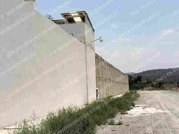 TERRENO 32,500 mts cuadrados, BARDEADO 100% IDEAL ARA BODEGAS, USO INDUSTRIAL Y COMERCIAL