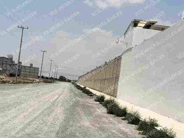 TERRENO 32,500 mts cuadrados, BARDEADO 100% IDEAL ARA BODEGAS, USO INDUSTRIAL Y COMERCIAL