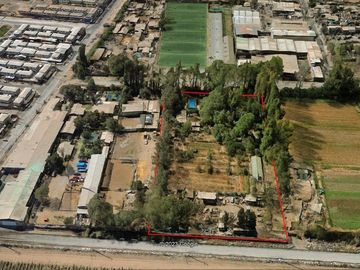 Parcela una hectárea suelo mixto: Industrial inofensivo, agrícola, comercial, habitacional. La Pintana.