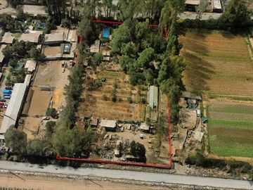 Parcela una hectárea suelo mixto: Industrial inofensivo, agrícola, comercial, habitacional. La Pintana.