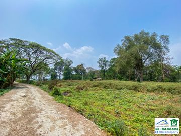 🏡 Waterfront land for sale, 23 rai, next to the Kwai Noi River, Samrong Island, Kanchanaburi, beautiful, filled in along the road