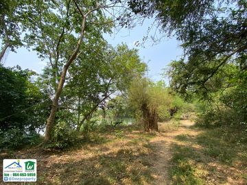 🏡 Waterfront land for sale, 23 rai, next to the Kwai Noi River, Samrong Island, Kanchanaburi, beautiful, filled in along the road