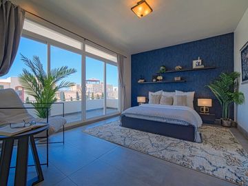 Villa con vista al oceano y a unos pasos de una extensa playa arenosa