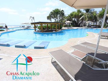 Depa con terraza y vista a los jardines y albercas