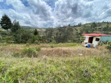 Vendo Terreno con Casa en La Montaña de Zhucay