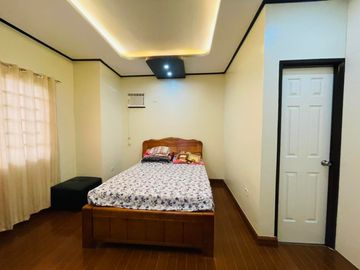 FOR SALE PRE OWNED HOUSE WITH EXTRA LOT ALONG MAIN ROAD NEAR CLARK AND NLEX