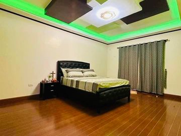 FOR SALE PRE OWNED HOUSE WITH EXTRA LOT ALONG MAIN ROAD NEAR CLARK AND NLEX