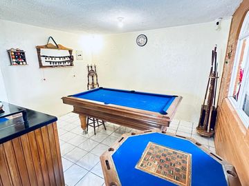 GUILLERMO MORALES vende terreno con casa Guayllabamba