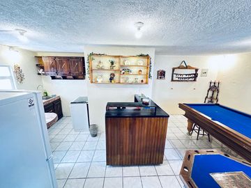 GUILLERMO MORALES vende terreno con casa Guayllabamba