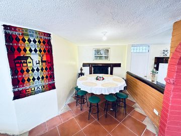 GUILLERMO MORALES vende terreno con casa Guayllabamba