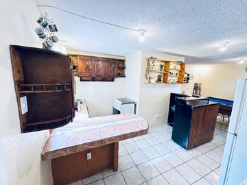 GUILLERMO MORALES vende terreno con casa Guayllabamba