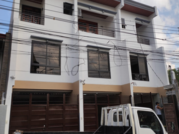 4BR Townhouse for Sale at Roxas District QC