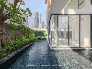 5 Bedrooms | 7 Bathrooms | The house surrounds a garden and private swimming pool.