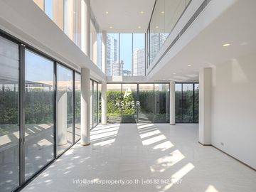 5 Bedrooms | 7 Bathrooms | The house surrounds a garden and private swimming pool.