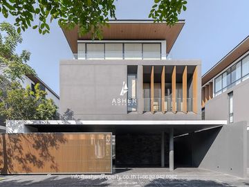 5 Bedrooms | 7 Bathrooms | The house surrounds a garden and private swimming pool.